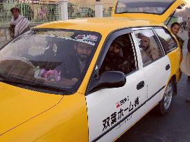 Kabul taxi drivers favor used Japanese cars